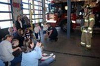 Fireman Talking to Kids and Parents